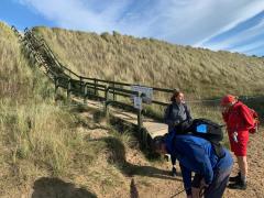 Walking behind the dunes at Horsey - sections of the beach are closed in Autumn to allow the breeding seals some peace